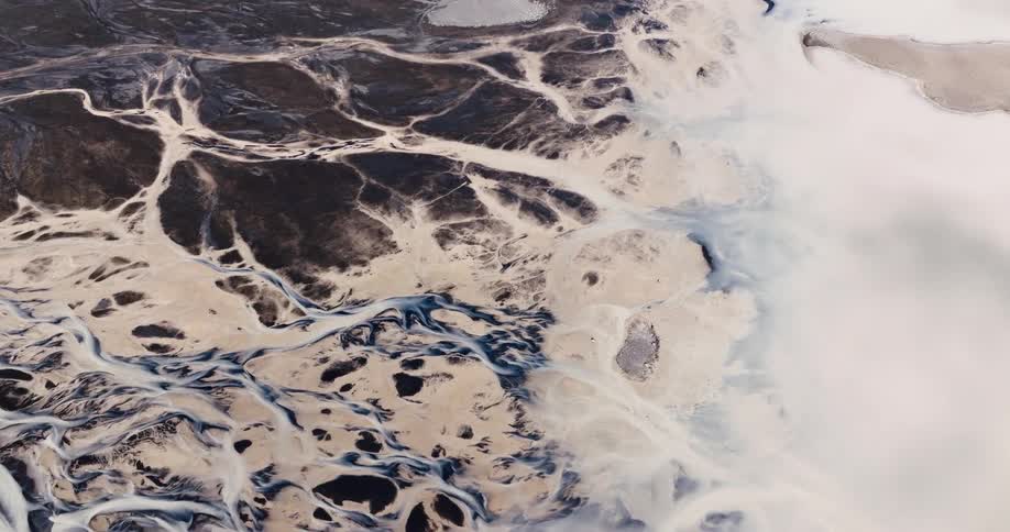 Aerial view of a landscape with intricate patterns of rivers and waterways