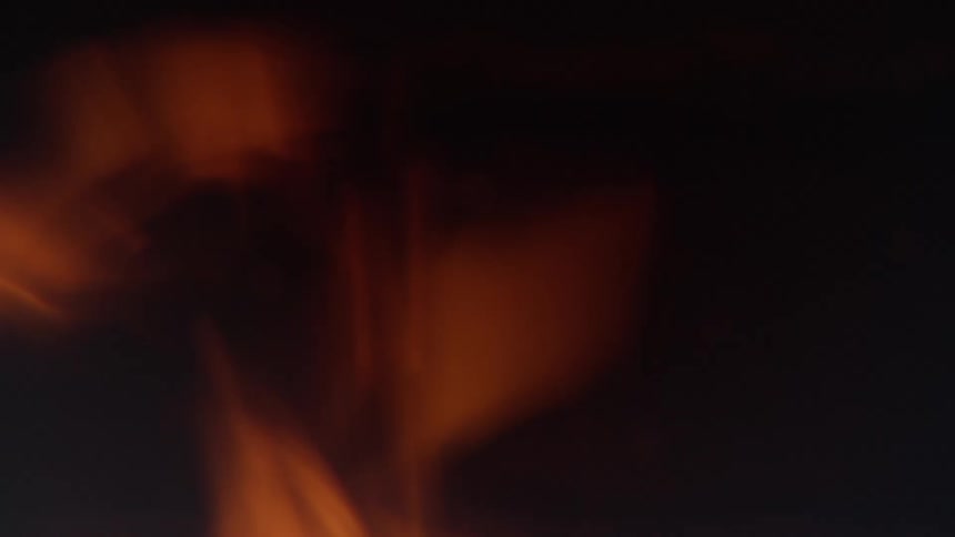 A fire is rising at night