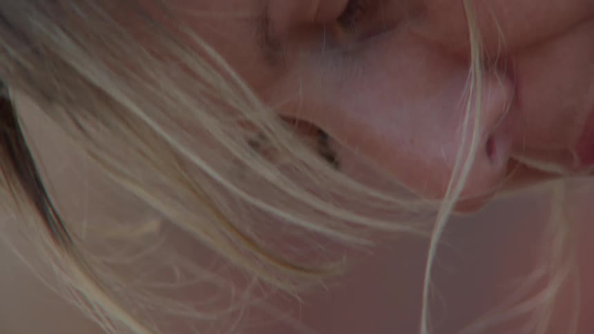 Portrait of a womans face with her eyes closed
