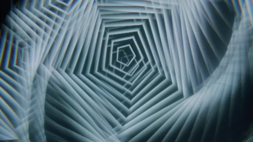 A spinning pattern of overlapping hexagons creating a sense of depth and perspective