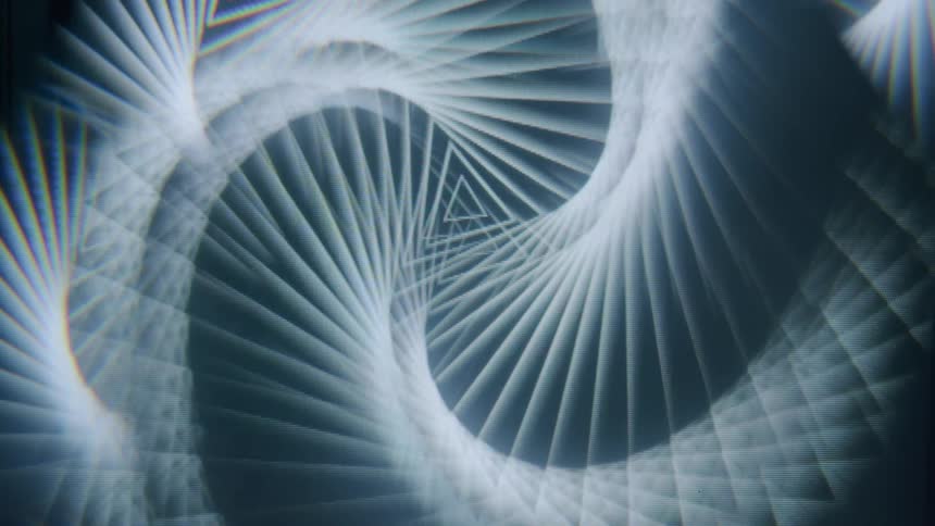 White triangles form complicated shapes in a screensaver