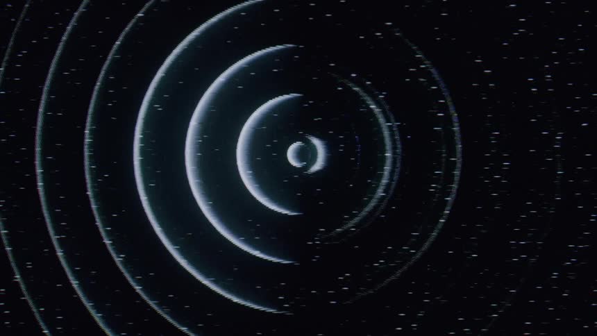 A swirling pattern of concentric circles expanding outwards