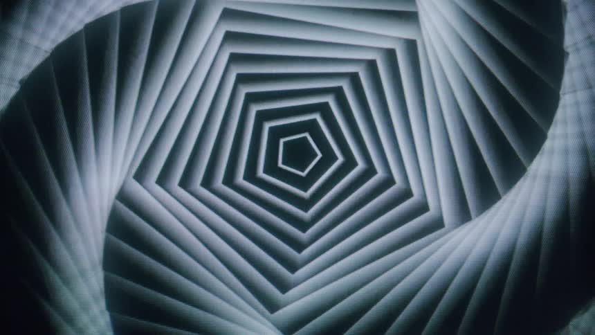 A mesmerizing spinning pattern of overlapping hexagons creating a sense of depth and perspective