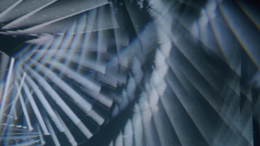 A swirling pattern of faint glowing lines radiating outwards