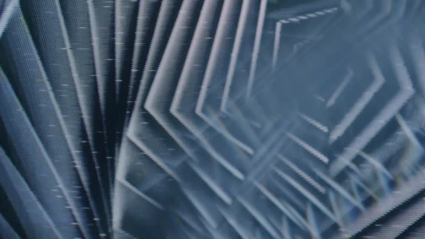 A spinning pattern of overlapping lines creating a sense of depth and perspective