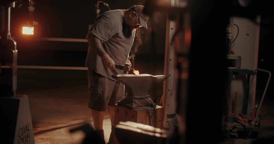 Man forging a hot metal
