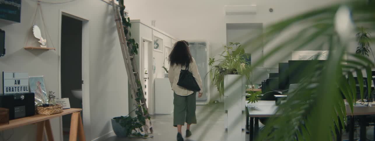 A woman walks out of the office