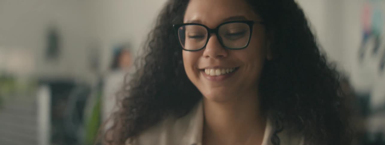 Woman ending a conversation and taking a deep breath