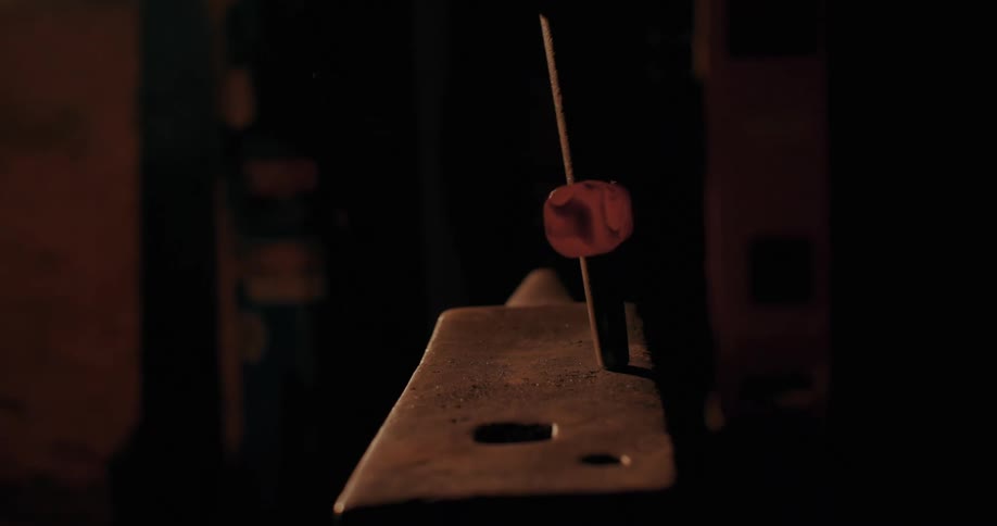 Person forging a hammer