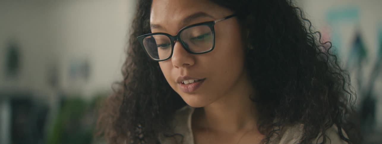 Portrait of a woman with glasses talking