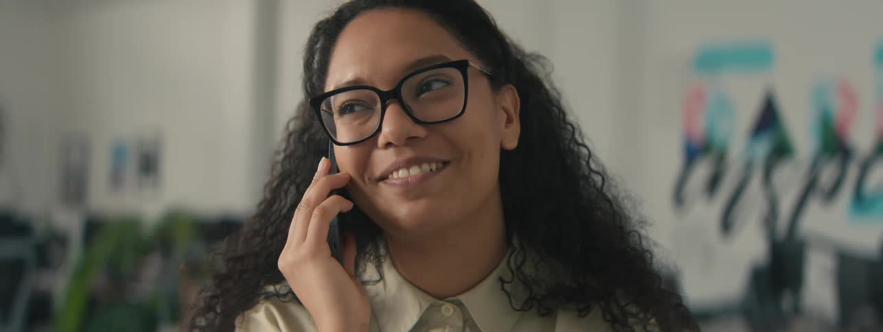 Young woman talking on cell phone