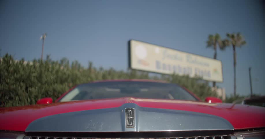Front of a red vintage vehicle