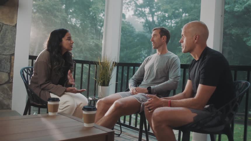 Friends are talking on the porch