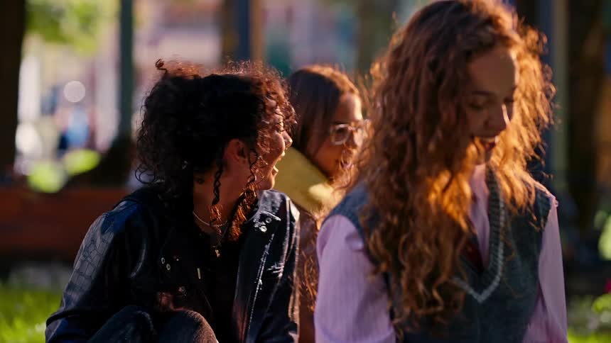 Group of students sitting and talking