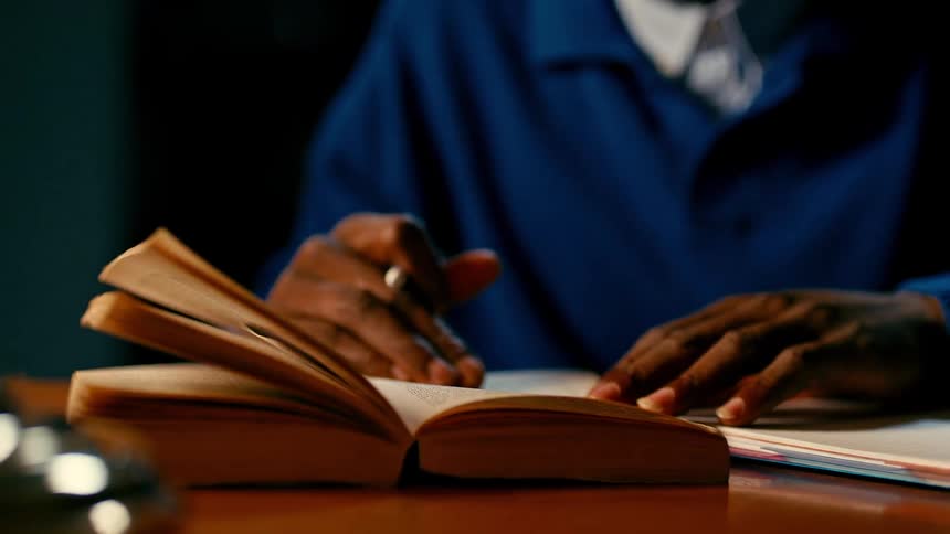 Young man studying late at night