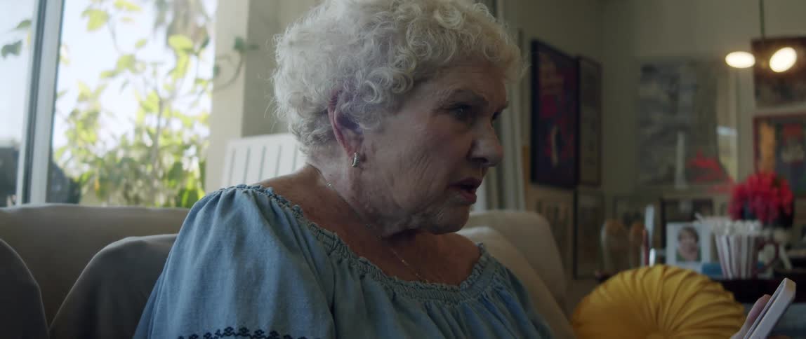 A clip of a granny operating a phone