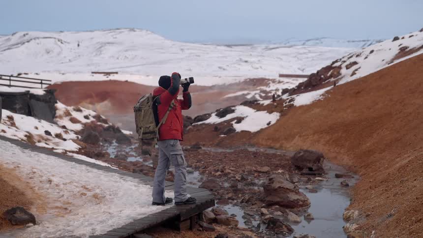A clip of a cameraman out in the arctic