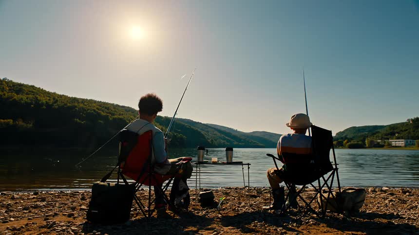 A clip of boys fishing at the lake