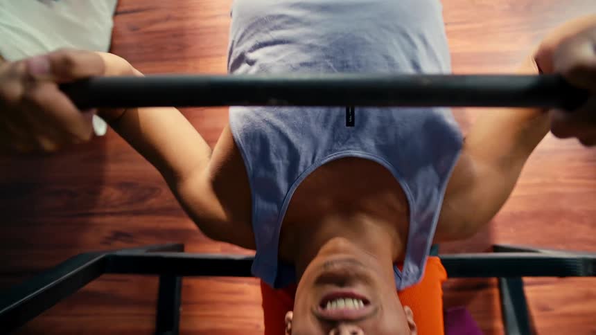 A clip of a person lifting a weight