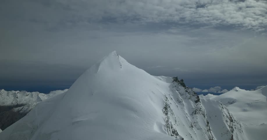 The mountain range is covered in snow