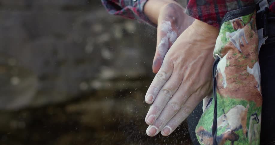 A person powders their hands