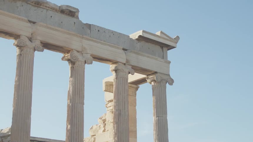 Classical architecture of columns against a blue sky
