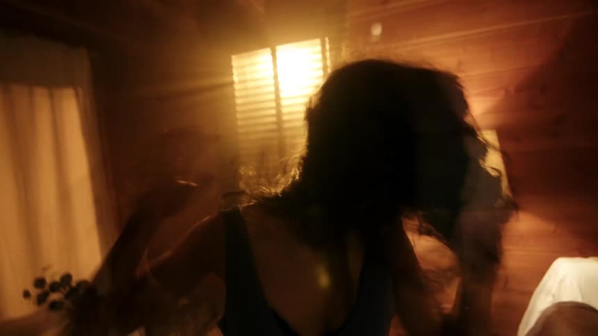 Portrait of a woman shaking her hair