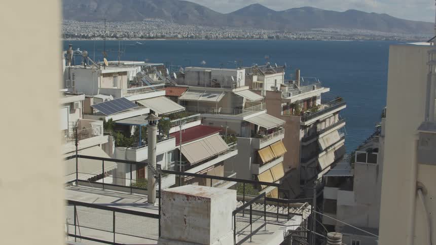 A view of the rooftops of a residential area in athens