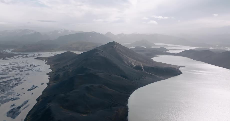 A rugged mountainous landscape with several glacial lakes