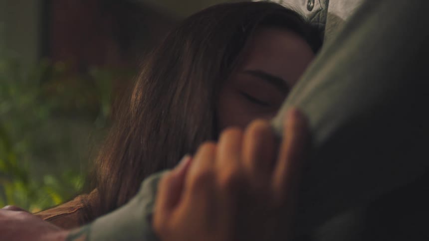 Woman hugging a man affectionately