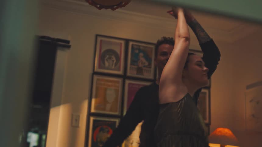 Couple dancing in the living room