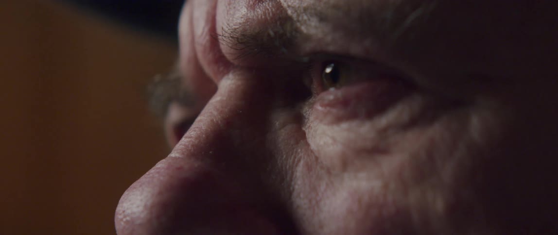 Closeup of an elderly mans emotional eyes