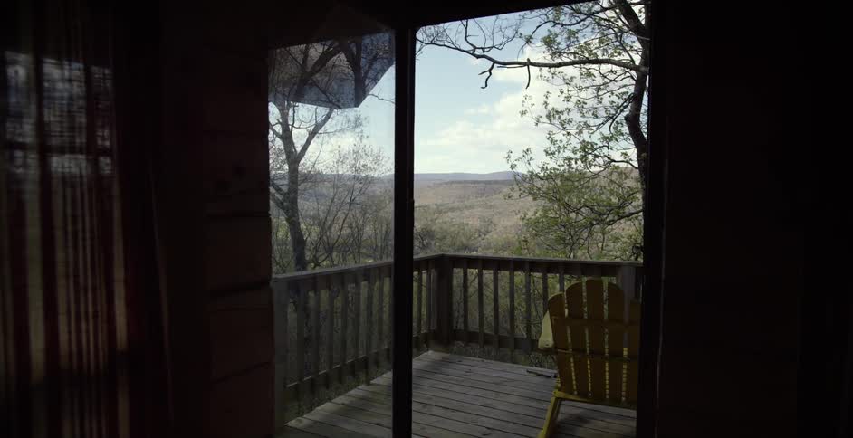 View of a balcony overlooking trees