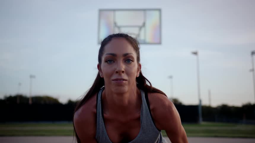 Portrait of a woman on a basketball court