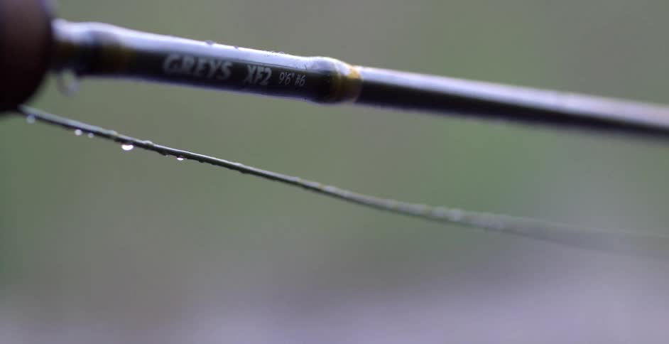 Close up of a wire underneath a long pole