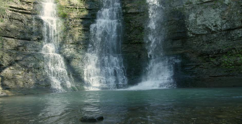 Waterfalls falling into a beautiful basin