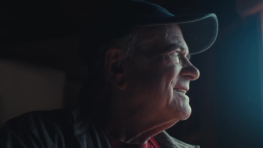 A clip of an elderly man laughing