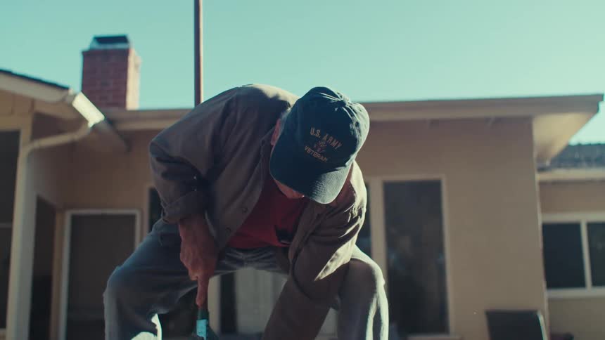 A clip of an elderly man cleaning