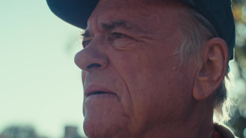 A clip of an old man thinking
