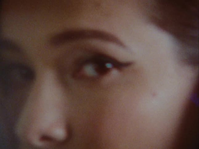 Portrait of a young woman with red lipstick
