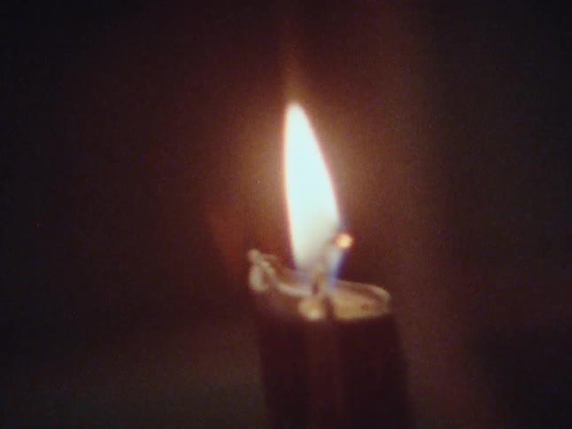 The candle is slowly burning