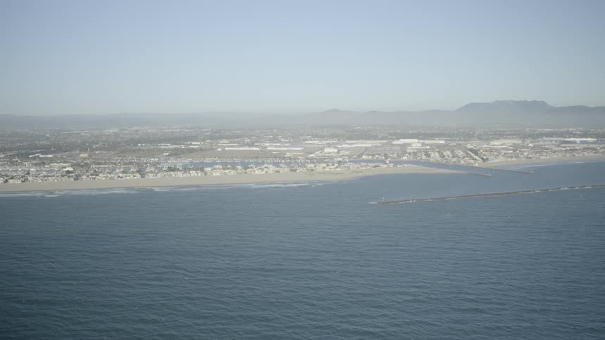 Aerial view of a broad shoreline on a clear day