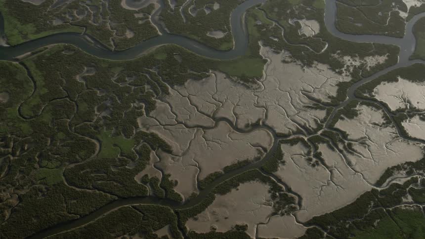 A windy river flows below