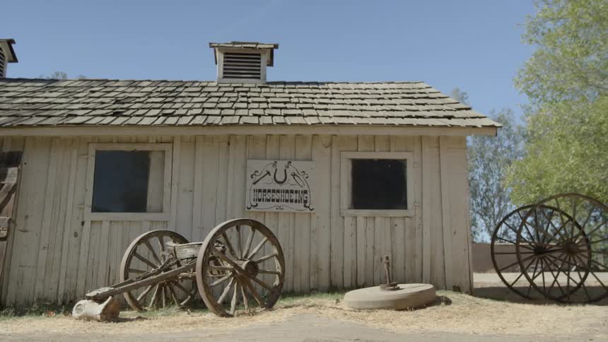 Old one story building on a clear day