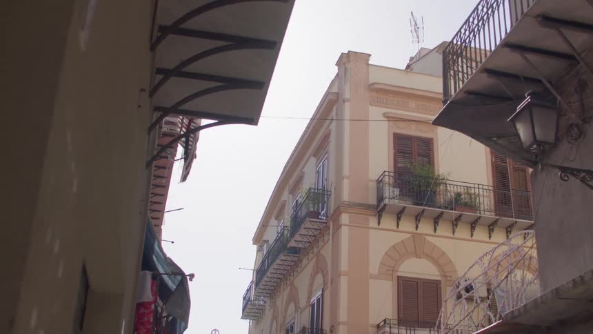 Exterior view of classical buildings with balconies in a city