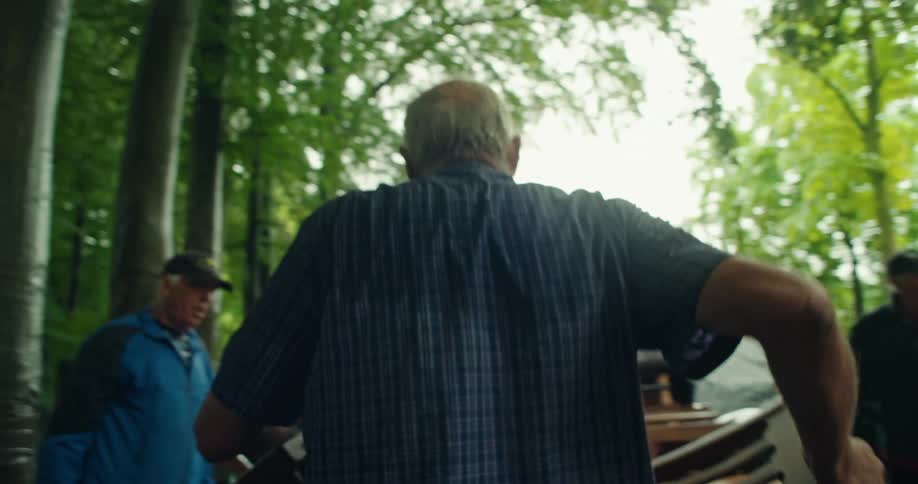 A clip of a man lifting a furniture