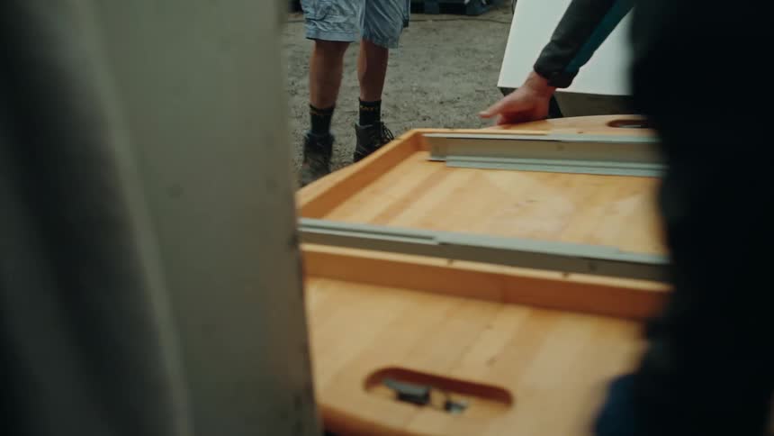 A clip of people lifting furnitures