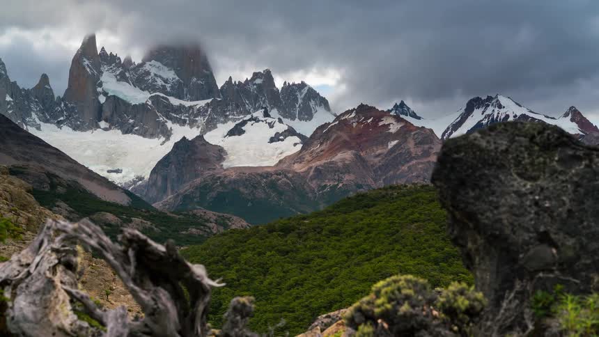 Snowy mountain landscape on a cloudy day