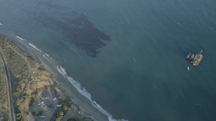Waves come to shore along the coast line