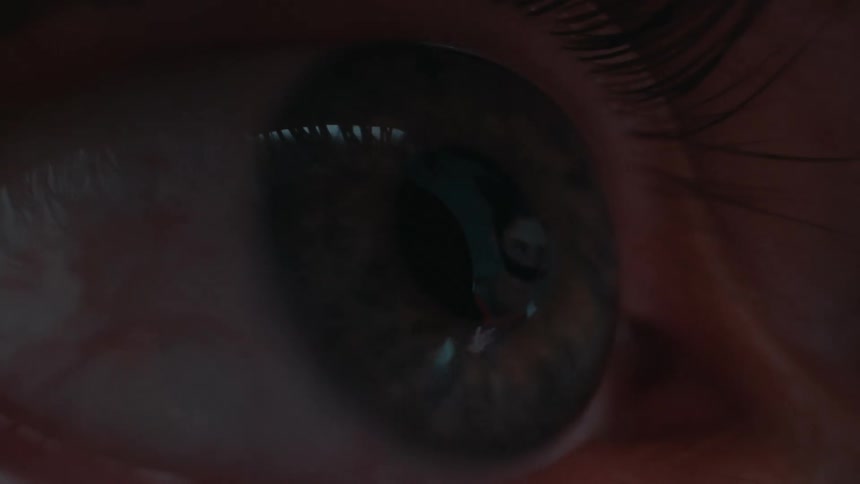 Screen of a device reflecting in a persons eyes